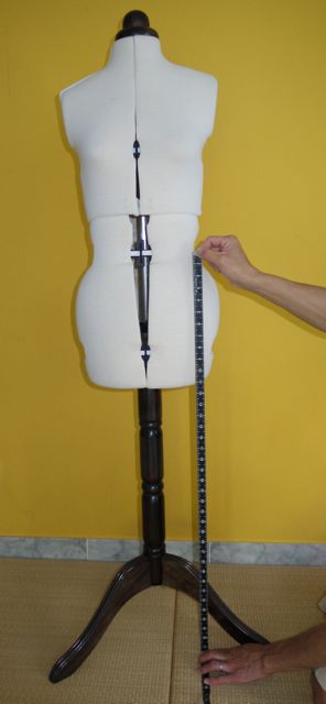 Measure from your natural waist to the length you want your finished hem to end.